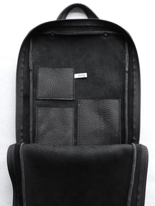 Fig backpack frrry black. inside view. three pockets. double finished leather.