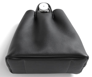 Monday frrry tote bag. shoulder strap. black. handle attachment. fold origami construction.