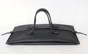 pumpkin frrry. foldable bag. black leather. flat pack. rectangle.