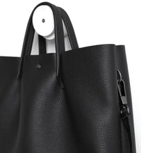 Load image into Gallery viewer, Monday frrry tote bag. shoulder strap.  black. detail view. snap hook. ring .
