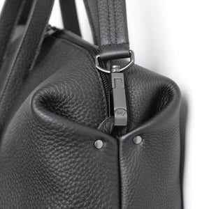 Wednesday frrry bag. black. chrome-free leather. detail. corner. snap hook.
