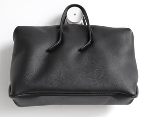 Wednesday frrry bag. black. chrome-free leather. bottom view.