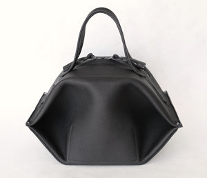 pumpkin frrry. foldable bag. black leather. zipper closure