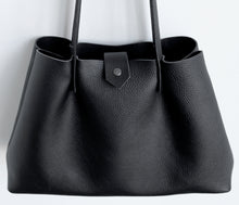 Load image into Gallery viewer, Amos frrry shoulder bag long handle black lindos calf leather. view from above. carry all totebag
