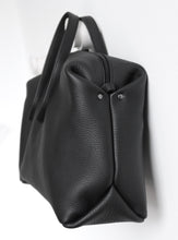 Load image into Gallery viewer, Wednesday frrry bag. black. side view. angry face. unintentional faces.
